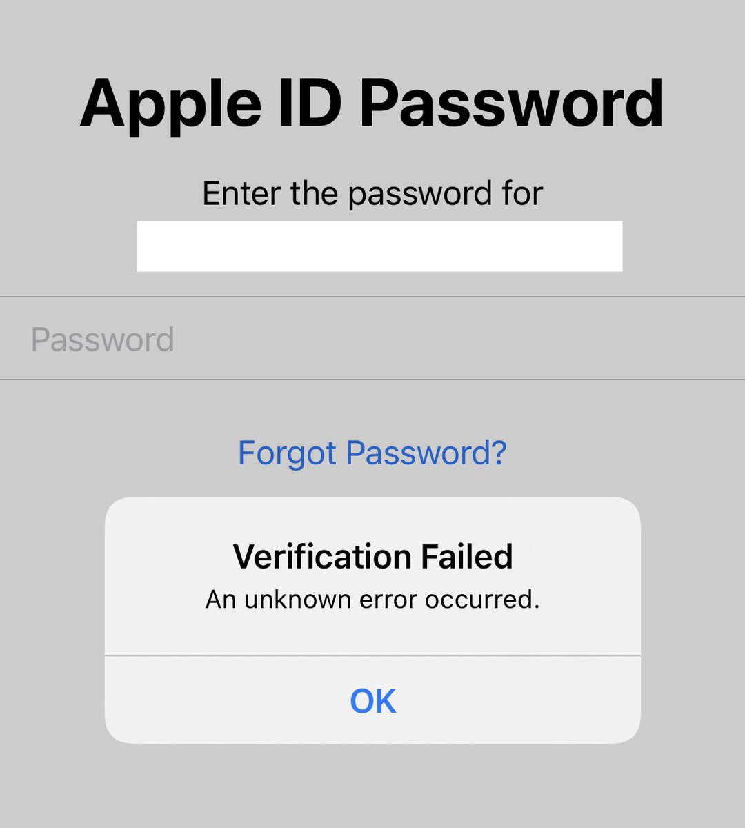 iOS iCloud sign-in dialog with error.