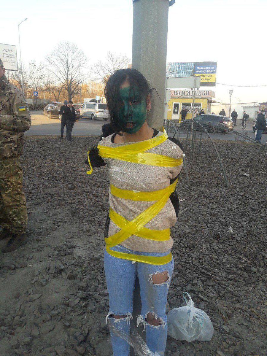 Sentletse's tweet photo. The Roma people being humiliated by Zelensky’s Neo-Nazis in Lviv. 

Denazification must be intensified. https://t.co/DcUpeBsPNe