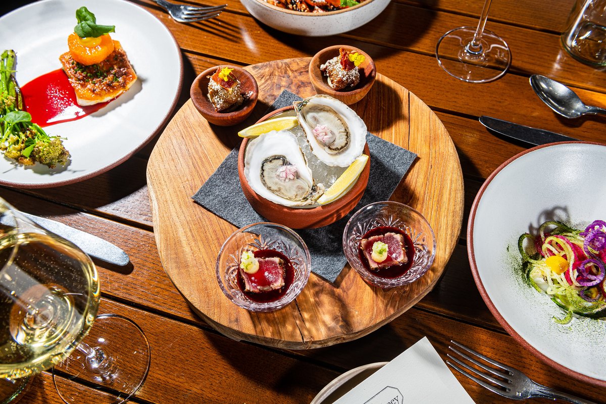 Oyster, Tuna, Fluke, and Black Bass - all locally sourced from our favorite purveyors and filled with the flavors of the region!