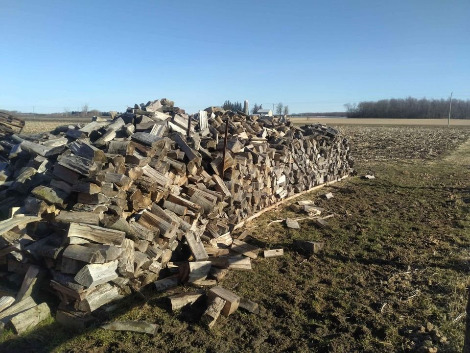 Hard Maple firewood for sale.  Trees were cut Jan of 2021.  Stacked outside, loaded into totes this spring.  $90-120 per tote depending on size of tote.  Pickup only outside Monkton.  Can load on your truck or trailer.  Works to approx $80 cord. Hand cut and split between 12-16in