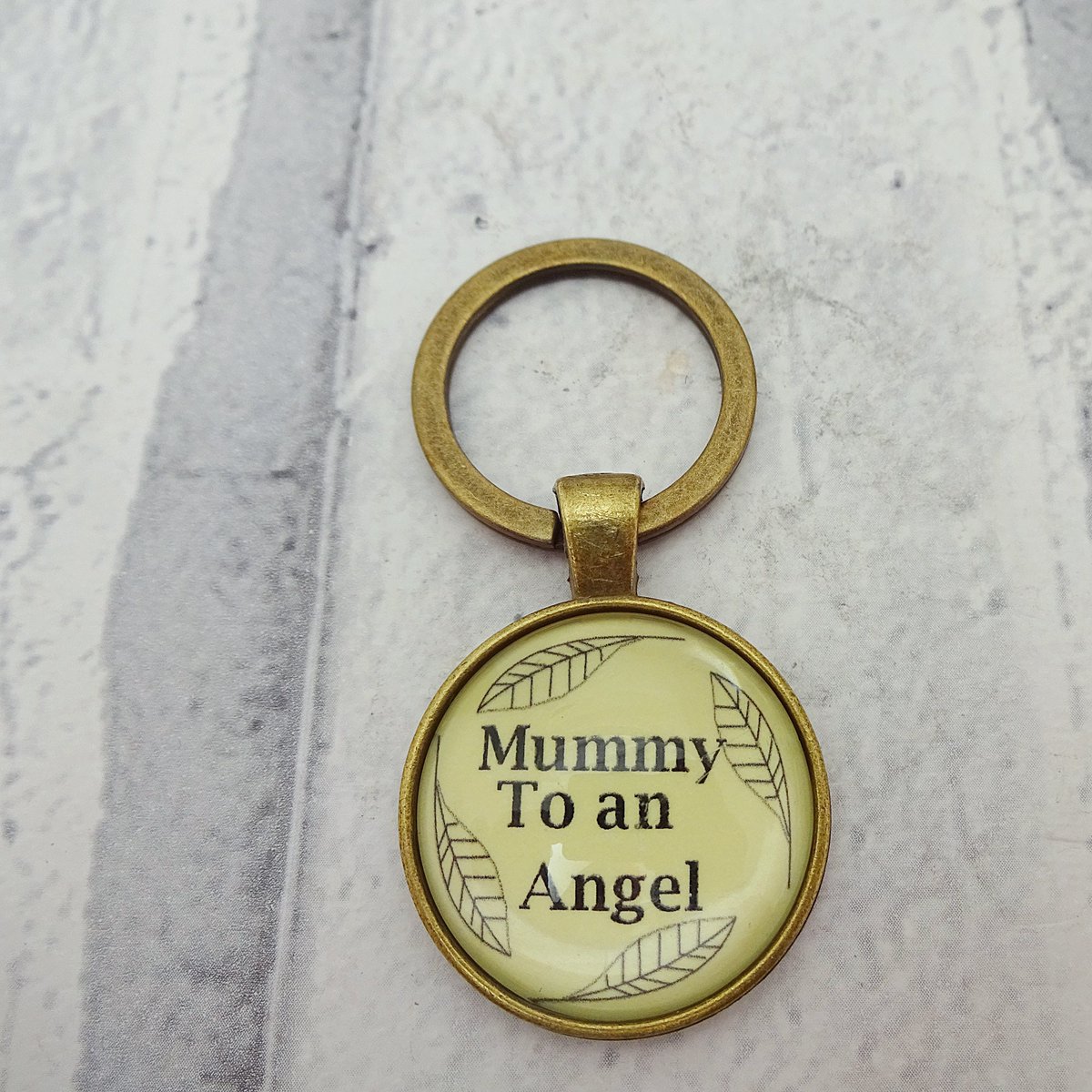 martisanne's tweet photo. Mummy to an angel keyring, miscarriage jewelry, baby loss keychain, memorial gift, infant loss, stillbirth, sympathy, feather, keepsake, B1 https://t.co/6V1DoaL3Gb #EtsyTeamUnity #TMTinsta #AngelFeather https://t.co/Siawm8Eux4