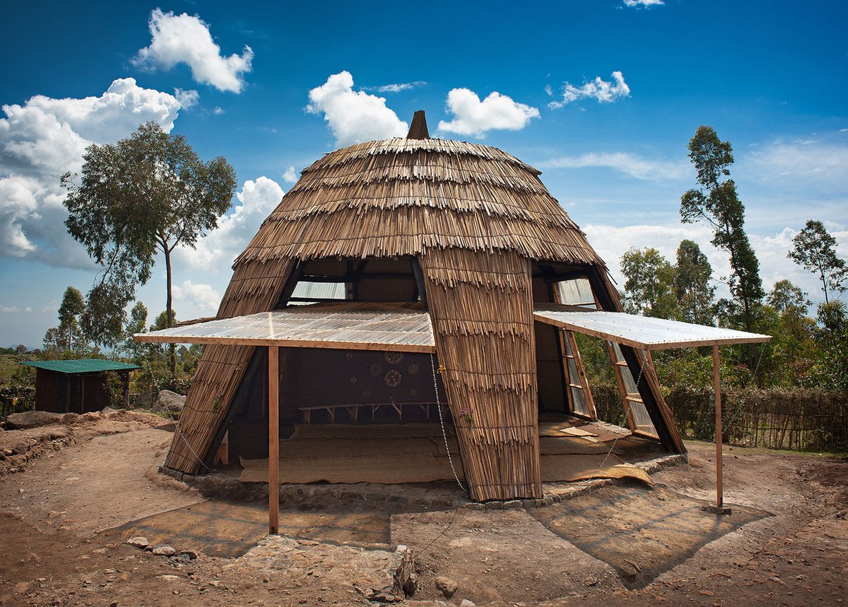 WikimediaUganda's tweet photo. #wikilovesafrica  An outdoor view of the Batwa ethnic group meeting shelter in South-Western Uganda - Photo by Kayondo Aloysius Collins CC-BY-4.0 https://t.co/NG3hpPlqqL https://t.co/5ZLXIcJfUM