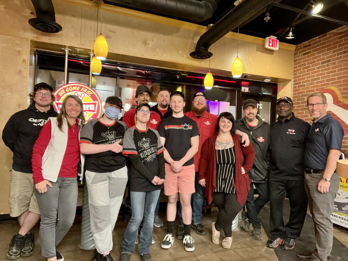 ToppersPizza's tweet image. Scott and Robin are full steam ahead on our #ToppersWorldTour! Stores 6 and 7 brought them to beautiful Eau Claire, WI where they visited the oldest remaining Toppers building, the first Toppers cut table, and of course a team of amazing pizza experts 🍕