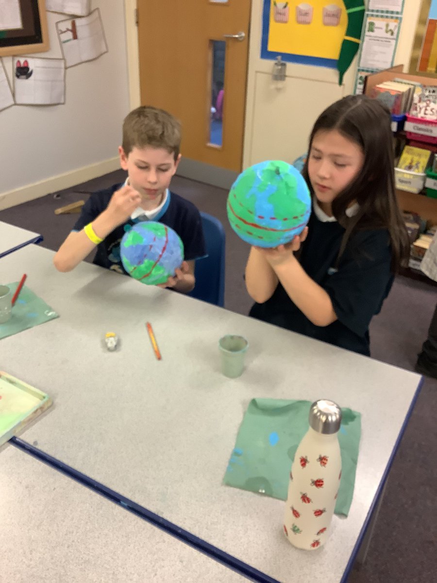 Year5tcps's tweet image. 5A did a super job of painting lines of latitude on their globes today! #geographyed