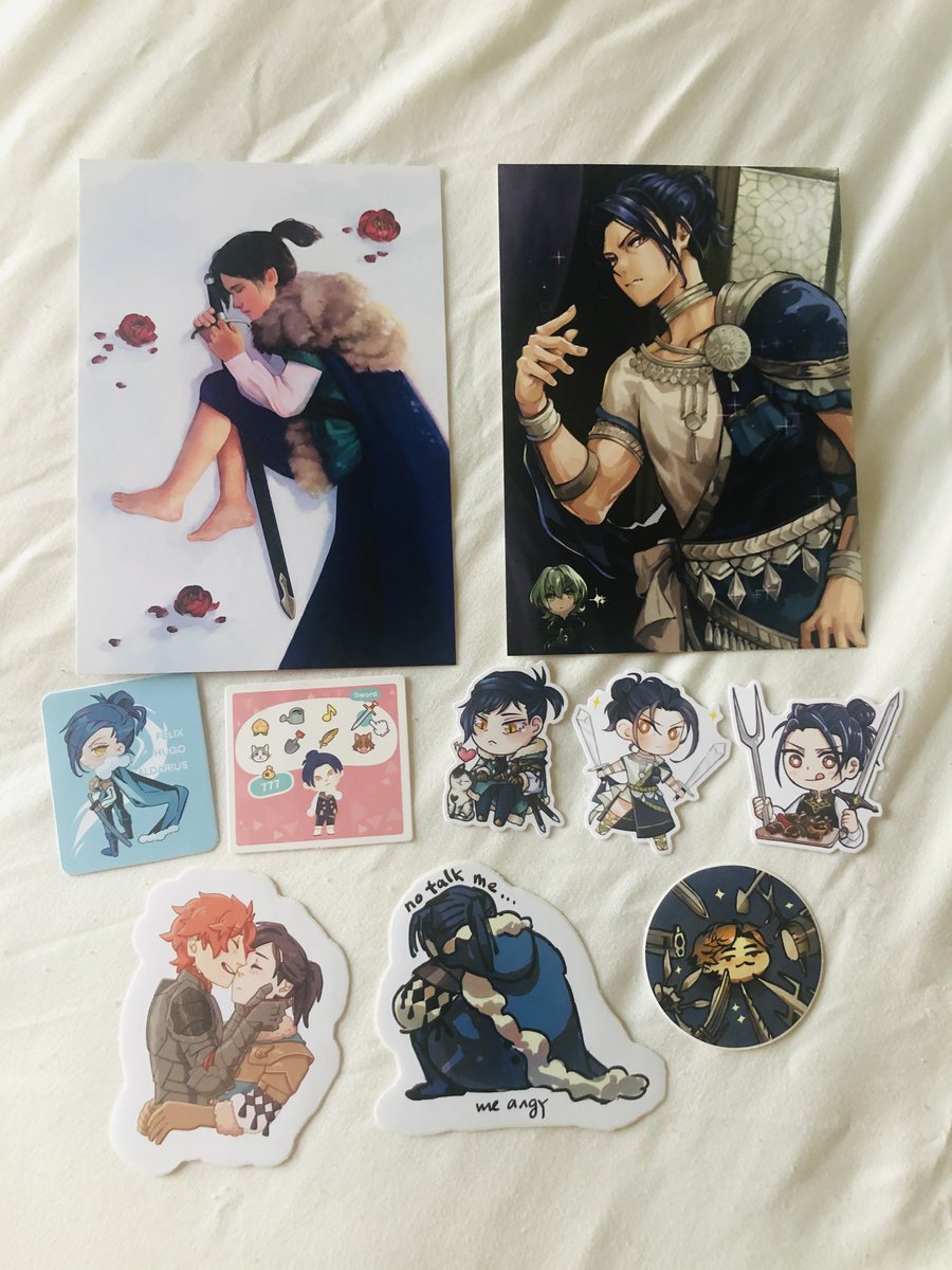 Surprised today by my <a href="/felixzine/">SWORD&SHIELD - A Felix Hugo Fraldarius Zine</a> bundle from leftover sales having arrived! Everything arrived just fine, and I really love the stickers and charms!! Time to look through the physical zine~ Thanks for the opportunity!