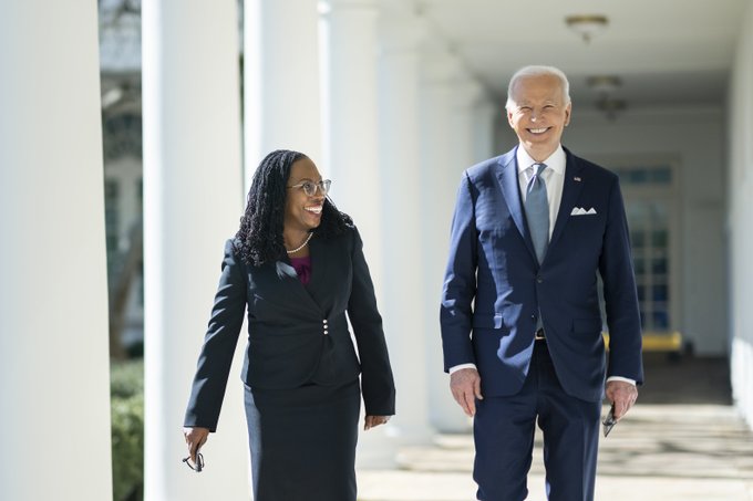 President Biden and Judge Jackson walk down the White House Colonnade