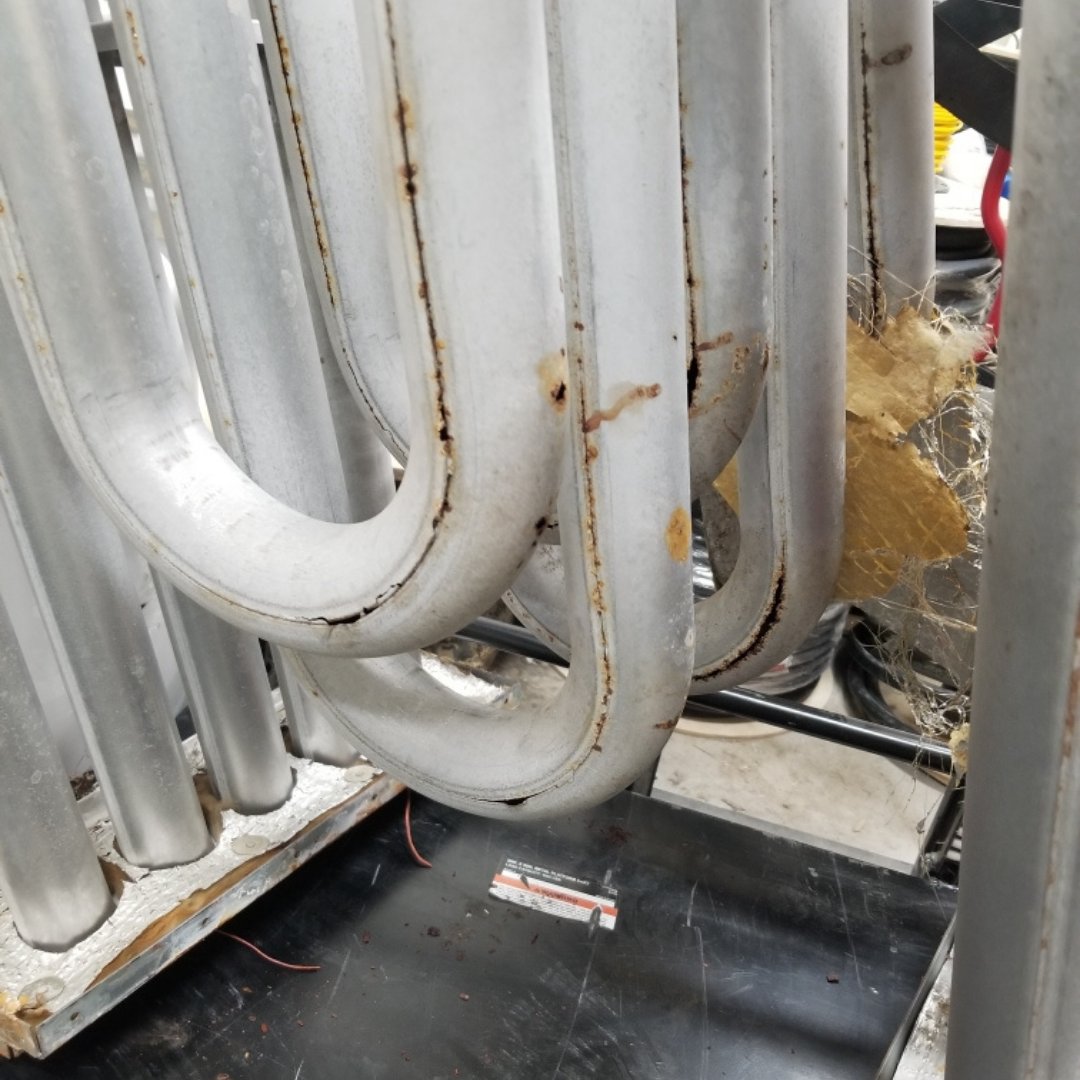 cartershvac's tweet photo. Can you spot what's wrong with this rooftop system's heat exchanger? Carbon monoxide travels through the heat exchanger and any holes present in the coils will leak that gas into the space it's heating.  #heatexchanger #heating #roofunit #CarbonMonoxide #maintenance #repair #HVAC https://t.co/68qCdsfcuf