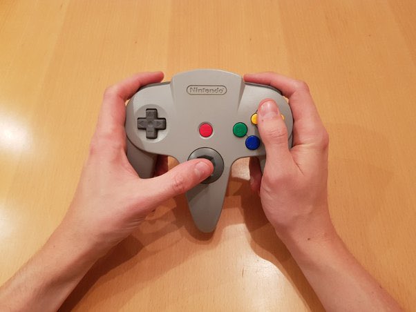 @LoveRetroBTW I remember when I first held one, I thought that you would hold the two outer grips and stretch your thumb all the way to the middle grip to control the stick. Than came the problem of trying to press the Z button so I had to stretchone of my middle fingers to press it.
