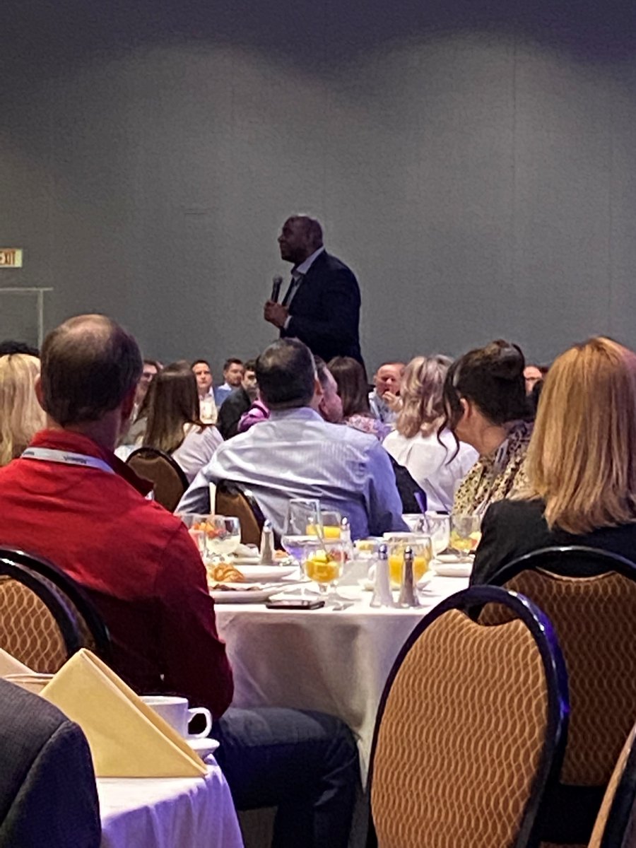 ScoutServices's tweet photo. We loved listening to the "magic" behind Magic Johnson at today's #SPECSSHOW2022 in Dallas today! "Coach said practice was at 10am - I showed up at 7:30." Now that's a work ethic that gets results!  Our team at Scout Services can relate!  Thanks @ChainStoreAge! https://t.co/0SEjAeulai