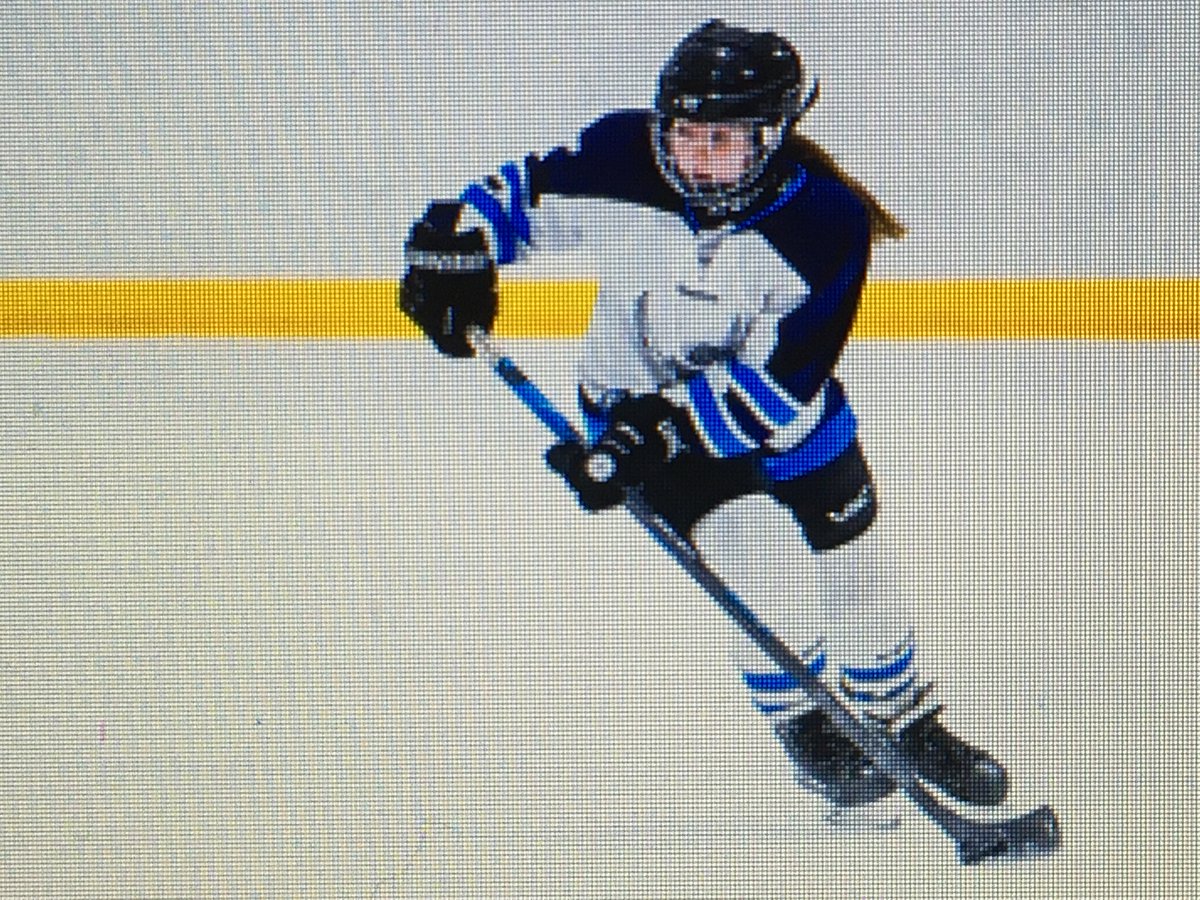 Forward Gabby with in tight puck protection and eyes up. Always great to see these moments captured with a camera to confirm the skills of players for them.