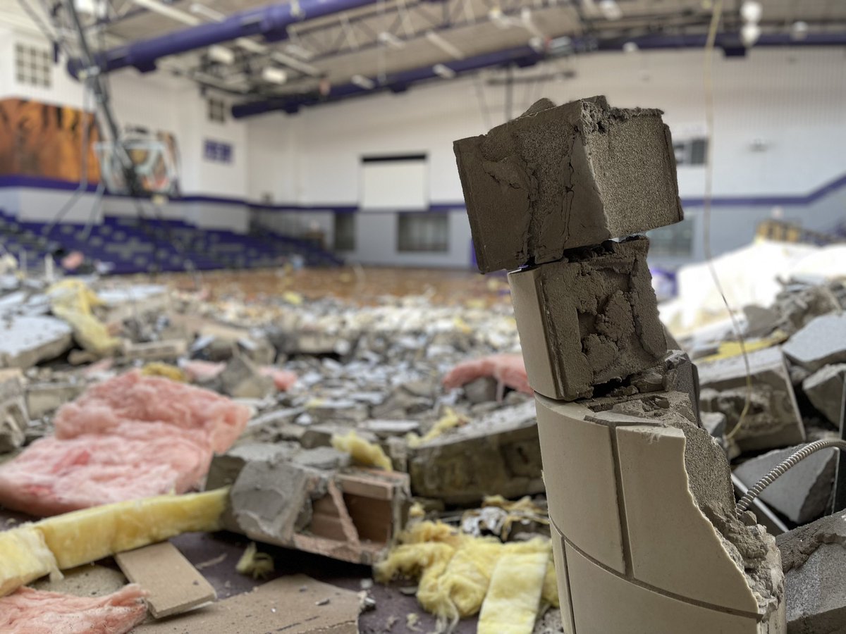 tliou's tweet photo. Inside the gym at Jacksboro High School - severe tornado damage.

There were a few students and faculty at the school. All safe. 

@wfaa @wfaaweather @JesseWFAA https://t.co/9agAs0BiI8