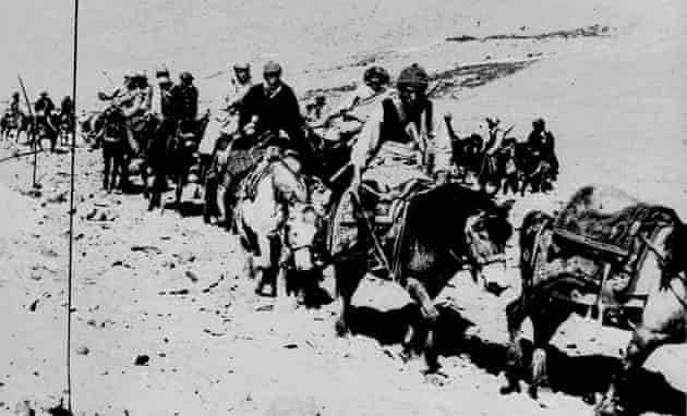 RinchenKunchok's tweet photo. On 21 March 1959: The Dalai Lama and his #escape  party on the fourth day of their flight to freedom as they cross the Zsagola pass, in Southern Tibet, while being pursued by #Chinese #Military forces. The 23-year-old Dalai Lama, is on the white horse in the centre. https://t.co/d68IH6T7PO