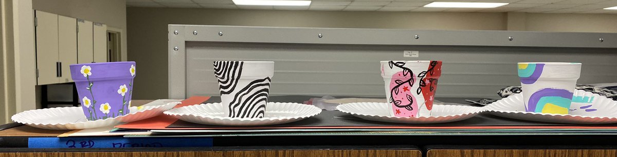 Craft Club spent this rainy afternoon painting flower pots. <a href="/ORWarEagles/">Oak Ridge High School, Conroe ISD</a>