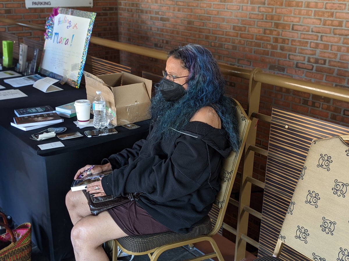 LilithDorsey's tweet photo. Candid book signing photo at last weekend’s #Paganicon , this was right before I sold out of all but one title. #AuthorsOfTwitter #OrishasGoddesses @WeiserBooks #WaterMagic @LlewellynBooks https://t.co/4z5lui08aX