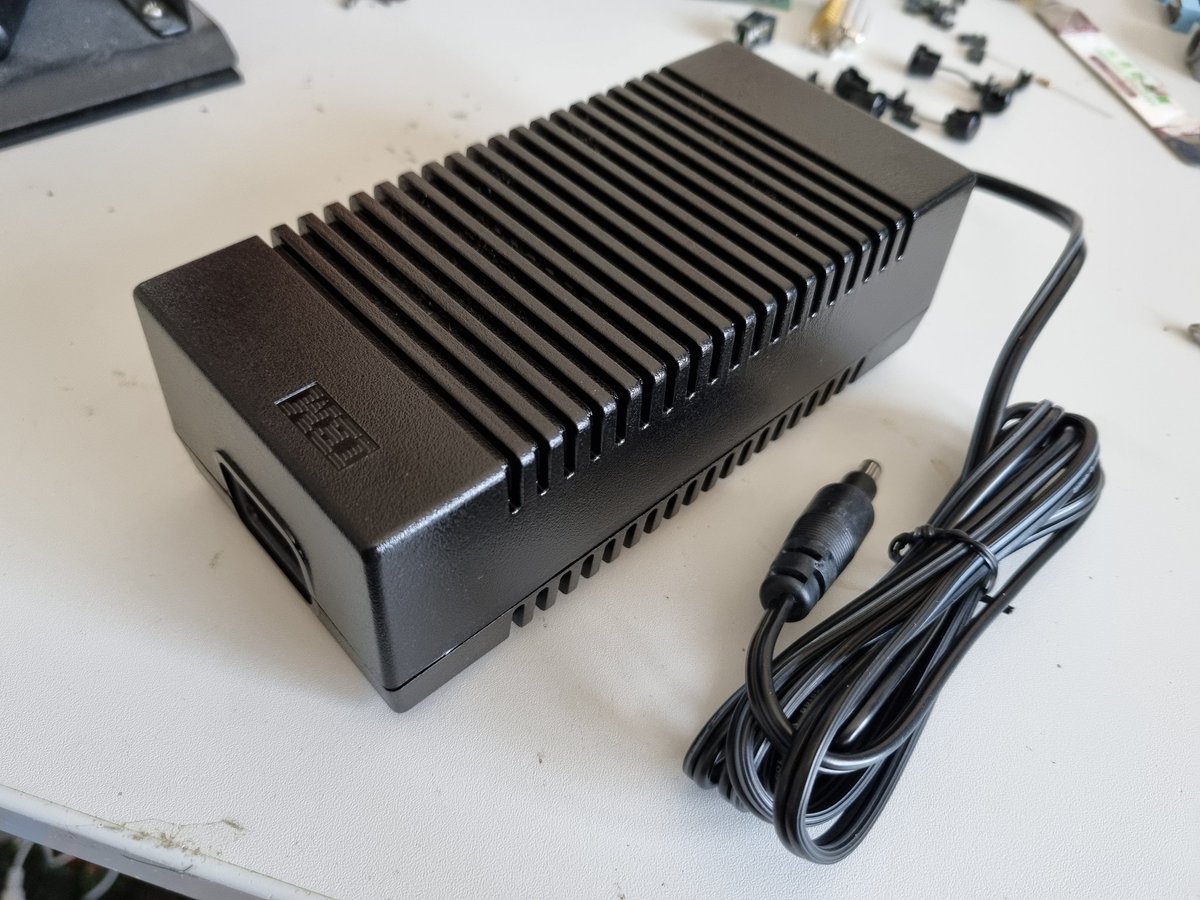 MonotechPCs's tweet photo. New in box IBM 5140 power supply.
I smelled the smell of cat pee as I closed the cardboard box after pulling it out.
The smell is so bad up close.
It's gonna be full of leaking caps :'D https://t.co/Nk9sIJ5y5P