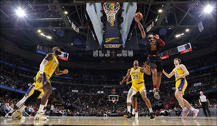 Detroit Pistons guard Allen Iverson heads down the court against the Denver  Nuggets in the third quarter of the Pistons' 93-90 victory in an NBA  basketball game in Denver on Friday, Jan.