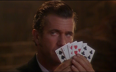 Maverick (1994) is a cocky western comedy starring Mel Gibson as a fast-talking and cowardly gambler trying to scrape together enough money to enter a once-in-a-lifetime poker tournament.