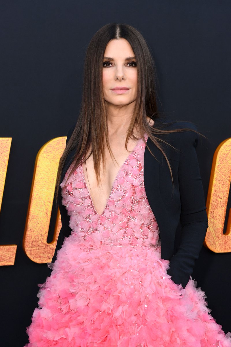 etnow's tweet photo. She is beauty and she is grace - she is Sandra Bullock making a show-stopping arrival at #TheLostCity premiere. 💗

(📸: Getty Images) https://t.co/GB2xemFgEb