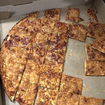 bcrypt's tweet photo. the thing everyone here needs to know about my hometown (st. louis, missouri) is that we cut pizza like this and bagels like this https://t.co/CVTFyiixJg