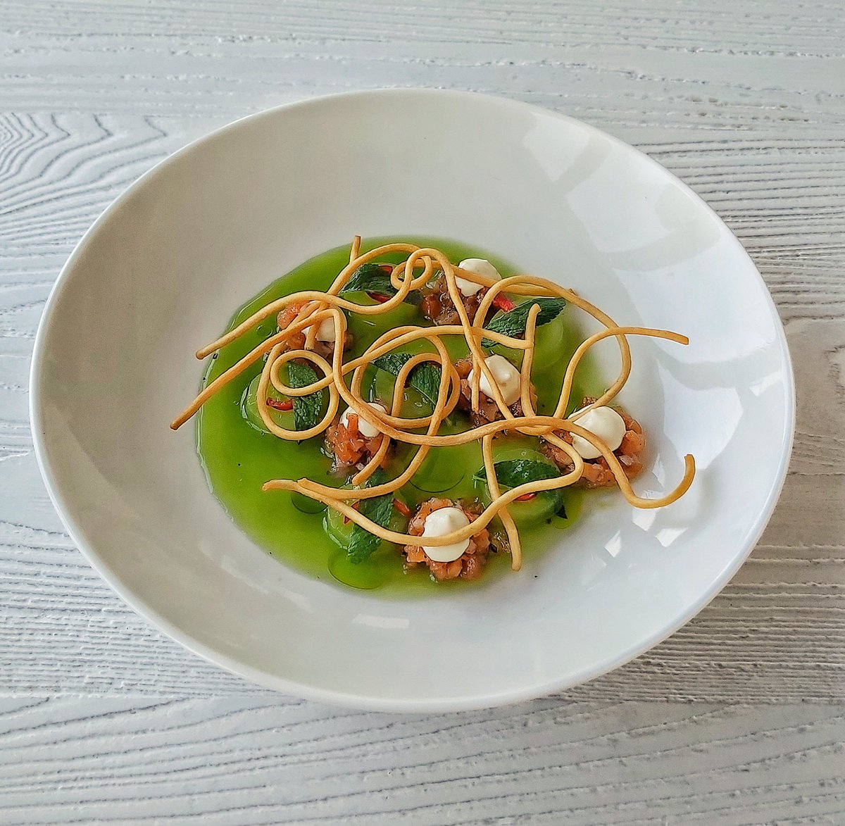 Cured Goatsbridge trout, lemon aioli, cucumber and mint salad, pickled chillies, grissini bread sticks.