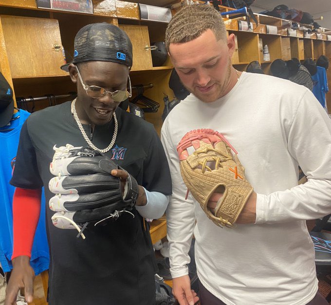 barstoolsports's tweet photo. Jazz Chisholm showing off the ice cream cone glove. Absolute fire. @Starting9 

(Via @ariagloves) https://t.co/VcTcC5coVO