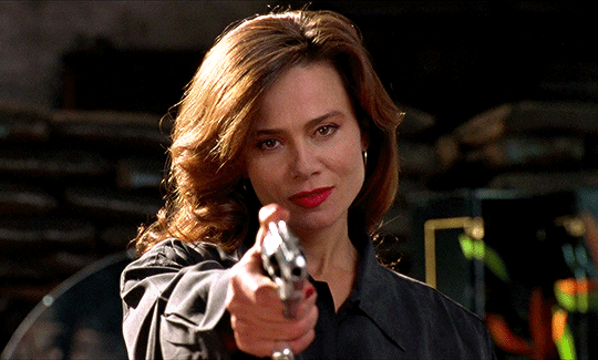 Zolota31's tweet photo. @TheSilvrscreen Ms. Mona Demarkov. My absolute fave character/femme fatale of all time. Once I saw her in this '93 gem, I was never the same. Truly a dynamite performance alongside Gary Oldman (whose bday was ystrday, might I add). Happy Bday, Ms. Olin!!! #lenaolin #GaryOldman #romeoisbleeding https://t.co/Q3eCa0Bafz