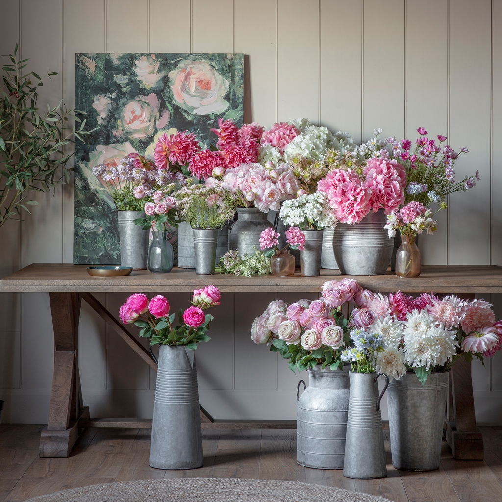 Create an eye catching display with our beautiful range of faux flowers. This collection of artificial stems explores the English countryside, offering a selection of roses, hydrangeas and peonies in soft tonal hues. #fauxflorals #fauxflowers #flowermarket