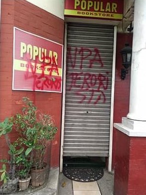 heyitspholop's tweet photo. First, they came to purge state university libraries of “subversive” materials. Now, they are going after Popular Bookstore and Solidaridad in what is obviously a coordinated attack. Red-taggers are now defacing bookstores. No other words to describe this but fascism on the rise. https://t.co/tmIA7TgA3K
