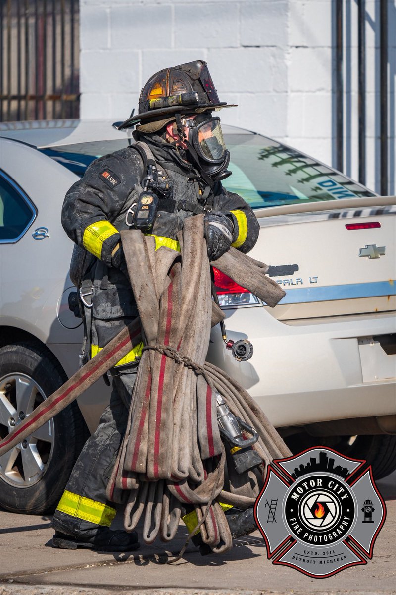 Ladder 25 Firefighter Stretches the bundle at an occupied commercial building fire. 
Plymouth &amp; Ashton
3/21/22