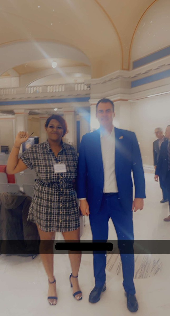 okprogressnow's tweet image. KEVIN STITT PHOTO OP FREAKOUT! The other week, Stitt, attempting to get a photo op at an advocacy day at the Capitol, gets visibly angry when a black woman takes her picture with him and raises her fist while doing it. 1/x