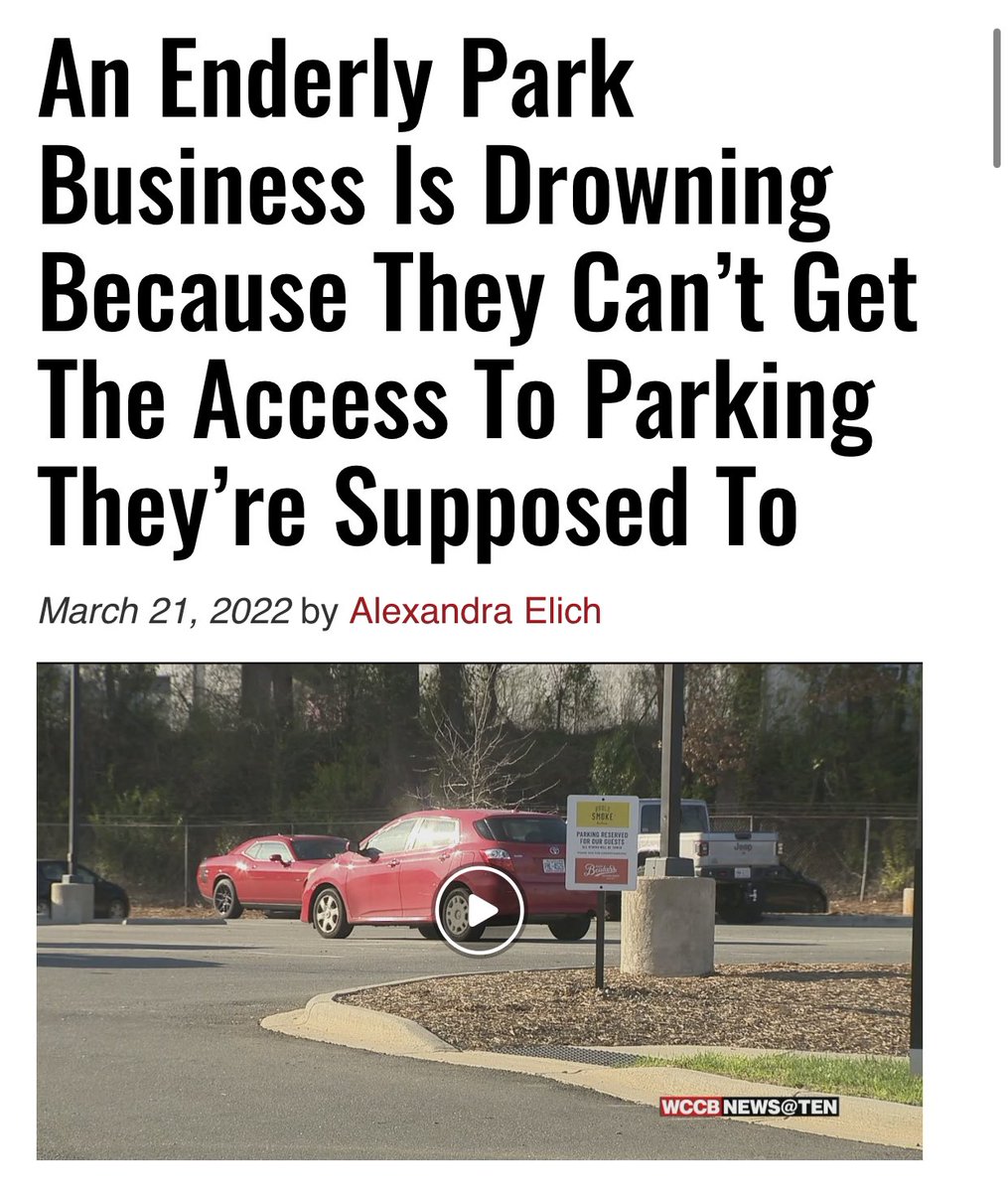 inside_485's tweet photo. Jim Noble is at it again. He’s put up “Noble Smoke Parking Only” signs in a parking lot he doesn’t own to force the patron’s a Black woman’s business to park in the back of the lot. 

cc: @WCCBCharlotte for the story, @WingzzaTruck for the tip https://t.co/RjTalLpsO4