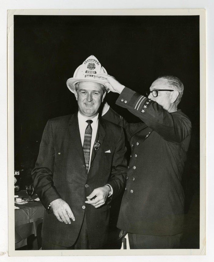 Governor John Connally donned Honorary Chief of Dallas Fire Department by Chief C.N. Penn, March 2, 1966. #txlege