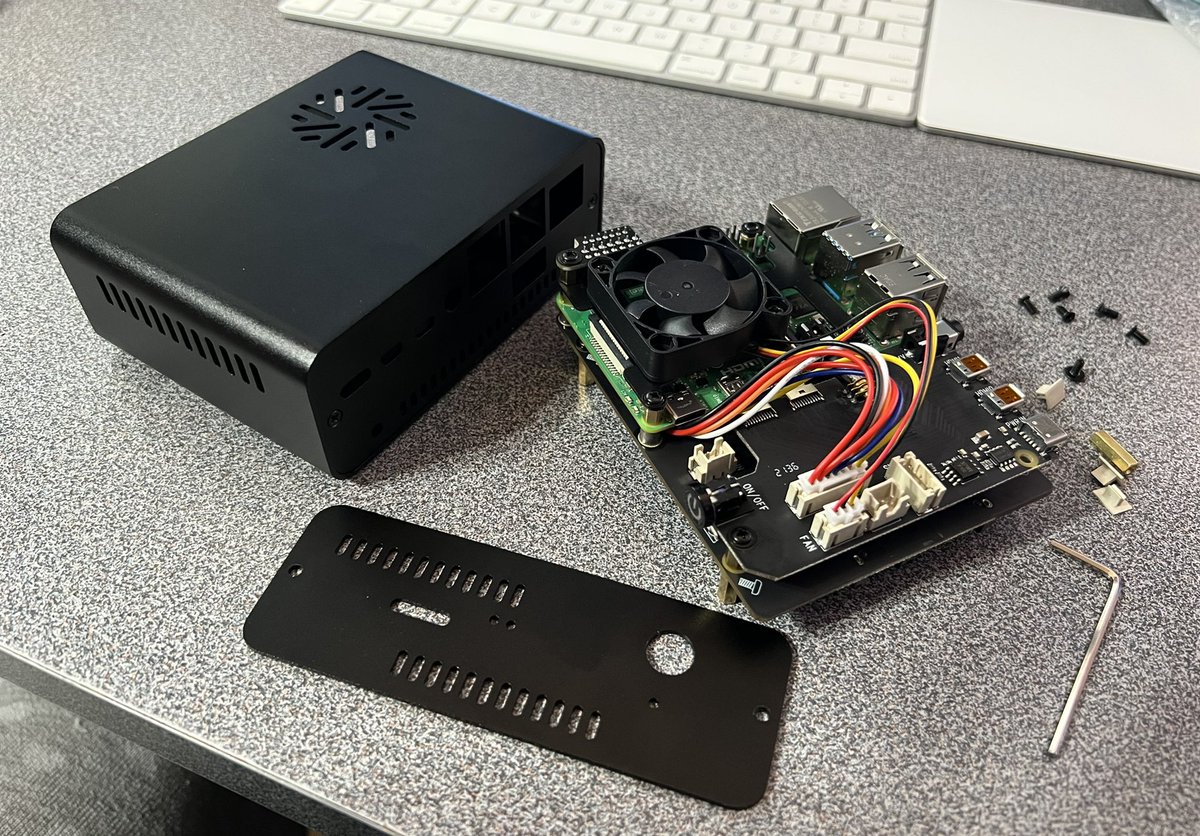 ooPo's tweet photo. Assembling a Geekworm NASPi to be used for RetroNAS. It’s a nicely compact unit that uses the standard RPi4 power adapter. https://t.co/EBICQN2HSz