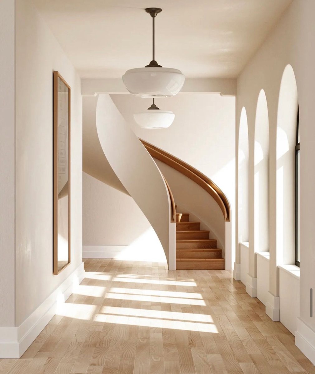 The details of this design are just breathtaking. From the arched windows that beautifully let in the natural light, to the curve of the staircase that becomes the focus of the space. Simply elegant.  

Design | @anthology_creative_studio