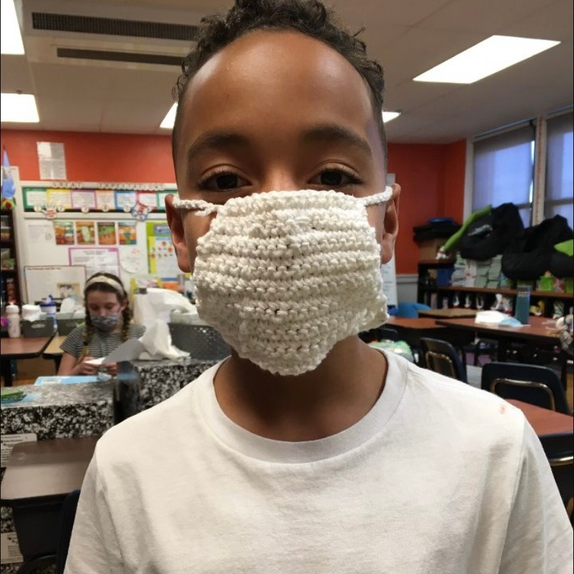 OKCPS's tweet photo. #StudentSpotlight: It’s a lovely day for crochet! Third &amp; fourth-grade students at Wilson Elementary are learning new skills at the newly formed after-school Crochet Club!  

One creative student practiced his skills by creating a mask! https://t.co/0K9ydRNixA