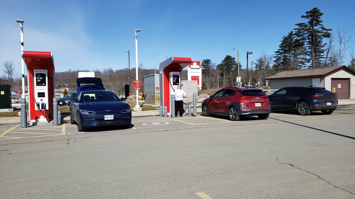 Fast charging in Seguin Ontario. Should have been a 10 minute stop with the EV6 (blue). The <a href="/petrocanada/">Petro-Canada</a> Charger on the right wouldn't kick on after ~10 attempts, the one on the left took ~10 minutes to get working, charged very slowly. This has been my norm when stopping here.