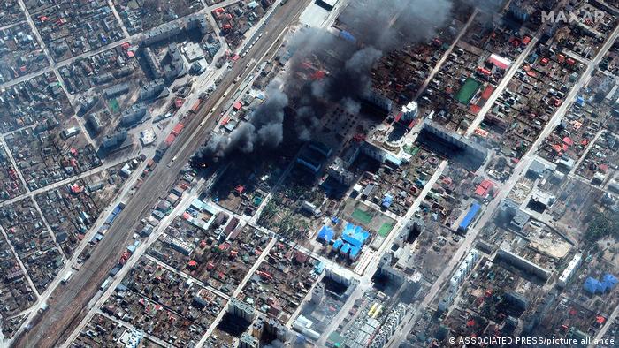 dw_russian's tweet photo. 27-й день полномасштабного военного вторжения России в Украине. Фотохроника войны: 22 марта. Больше фото - в нашей галерее https://t.co/IsJROAgBes https://t.co/XLBm9QxJSj