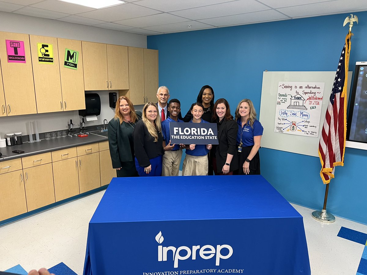 SaraCapwell's tweet photo. I think the sign (and the smiles) speak for themselves.  Thank you for including our school in this amazing experience. @GovRonDeSantis @CSUSAJonHage @EddieRuiz531 @InPrepAcademy https://t.co/RnjNpxz2MC