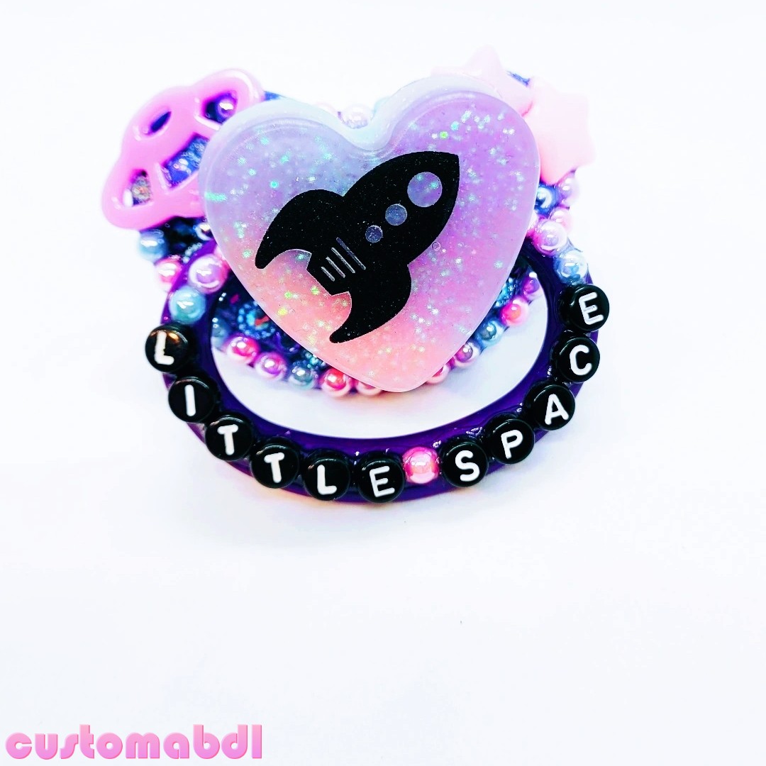 customabdl's tweet photo. Perfect for galaxy babes, explorers &amp; stargazers!   
Shop via https://t.co/KtzwihHxD9  #adultpacifier #abdl #petplay #puppyplay #ddlg #mdlb #mommydom #daddydom #ageplay #abdlpacifier #customabdl #littlespace https://t.co/yuOR2kDuAL