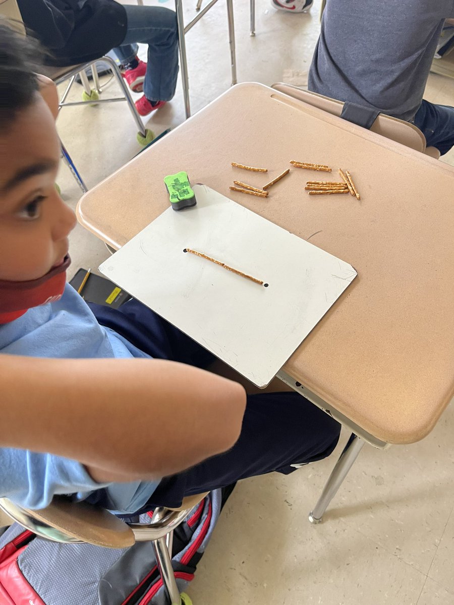 tonironi15's tweet photo. We were hands on today learning about parallel and perpendicular lines. Ss were about to use manipulatives to form different types of lines as well as take a picture of their choice and identify the different types of lines. #LHESmustangs #ccsleads #ccsk5math #seesaw https://t.co/2zxQULSLUy