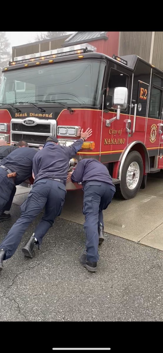 NanaimoFire's tweet photo. Today, our new Fire Engines were put into service at our Fire Station 1 and 2.  Following a long standing Fire Department tradition, our @IAFF905 Firefighters pushed the trucks into service.  This tradition has been carried over from when Fire apparatuses were pulled by horses. https://t.co/6Cv4YK7bIC