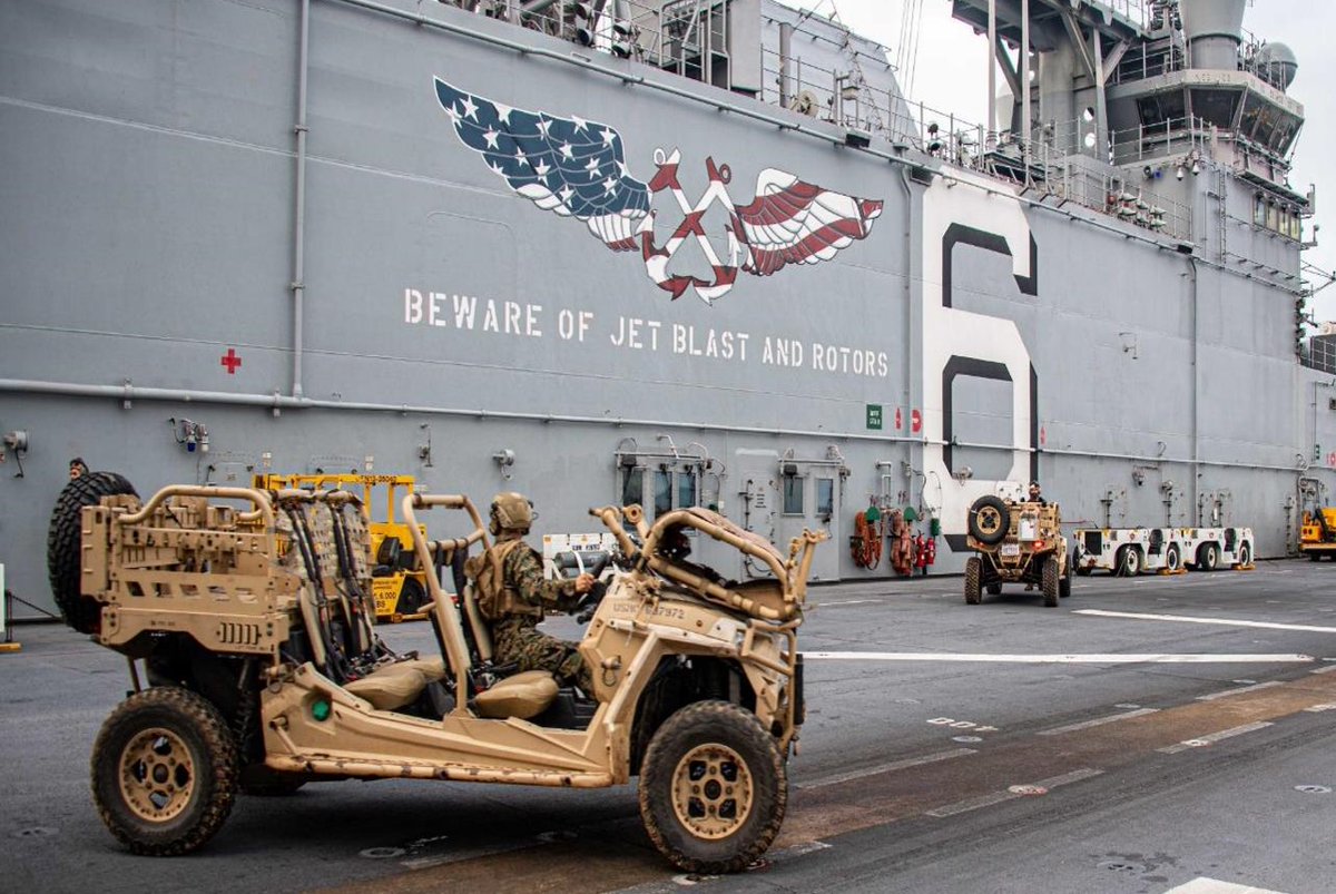 3d_MEB's tweet photo. PHILIPPINE SEA (Feb. 04, 2022) Marines assigned to the 31st Marine Expeditionary Unit work with Utility Terrain Vehicles on the flight deck of the forward-deployed amphibious assault ship USS America.
#FreeandOpenIndoPacific #AlliesandPartners #firsttofight #firsttorespond https://t.co/eCAn8qzMiW