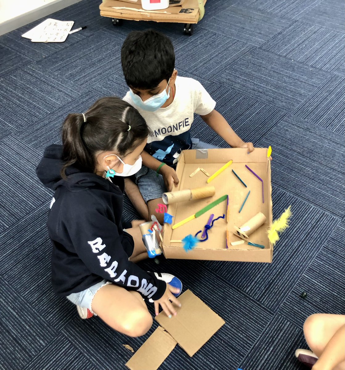 AISCElementary's tweet image. #AISCGrade2 students working on #AISCSocialStudies as they get ready for marketplace. #AISCLearner