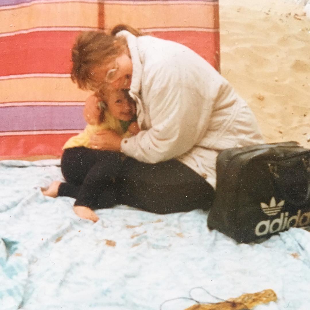 Since it’s #MothersDay on Sunday I wanted to share my favourite picture which is of course of me and my #mum. 

It was a chilly day at the beach and I can actually remember my mum wrapping me up in her coat to keep me warm. A perfect metaphor for how she cares for me to this day.