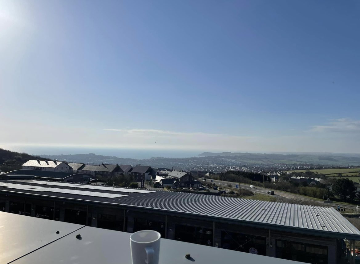 AustellPrint's tweet photo. No better way to start the day.  #Cornwall #seaview #CoffeeTime #staustell #conference #sunshine https://t.co/jwdoM7m1Gb