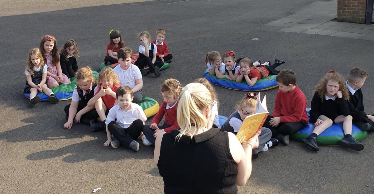 BlairhallPS's tweet photo. P1/2/3 took advantage of the lovely weather this afternoon and decided to have a story in the playground. #literacyoutside #storytime https://t.co/4aXYWjq1Kw