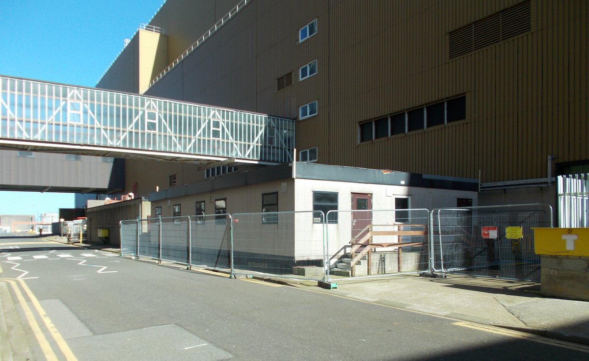 NRServicesUK's tweet photo. The first of several #Wylfa Site demolition projects planned for 2022  is underway.  KDC Decommissioning Services are preparing the former day operations building for its safe removal this weekend followed by two modular structures in the coming weeks. 
#DecommProgress https://t.co/d8EOjVrg6J
