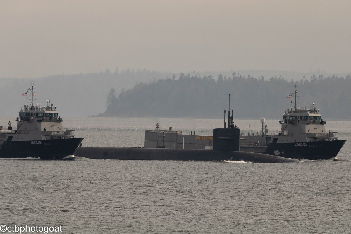 Submarine with escort in Puget Sound.