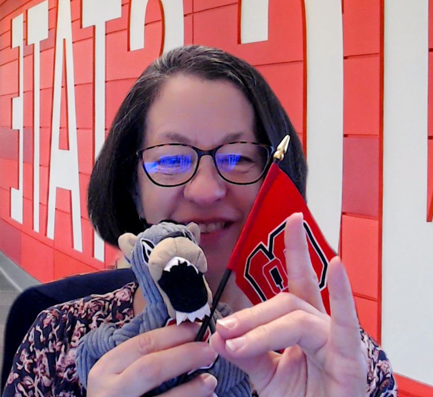 Sharing our NC State spirit with the Wolfie we got for our NC State loving dog Lucy. I came to NC State for school in 2005 and pretty much never left. I'm now working <a href="/cfacencstate/">Center for Family and Community Engagement (CFACE)</a> where we do important family and community engagement across the state. #GivingPack