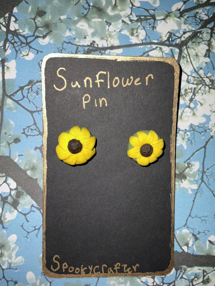 Chibiyato1's tweet photo. Okay guys they are finally available for order, you can get them in either cat or normal doughnut, in earrings, necklaces and pins, also available are sunflower skull necklaces, and soon two different playing cards will be available #SunflowersForUkraine #SmallBusiness #jewelry https://t.co/RNgHyML4mG